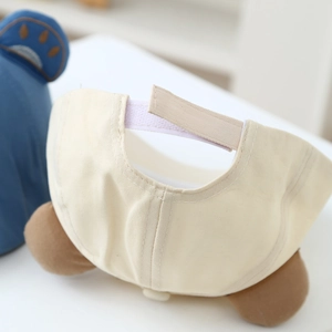 Adjustable baby beret hat with cute bear ears and cream cotton fabric back view