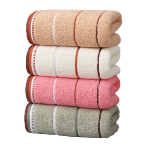 Thick absorbent cotton towels set of 4 in assorted colors with vertical stripes