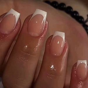 Classic white tip French press-on nails in long square shape with natural pink base