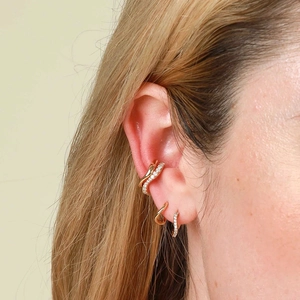 Elegant gold S925 silver needle curved hoop earrings set with zircon stones for women