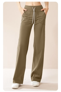 Detail view of high waist wide leg yoga pants with drawstring and side pockets