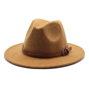 Detail of wool fedora hat with brown leather belt trim and silver metal buckle