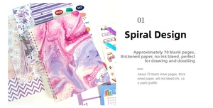 Detail of purple marble spiral notebook with silver coils, tassel charm and thick blank pages