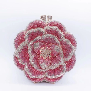 Close-up of pink and white rhinestones in a floral pattern on this elegant evening clutch bag