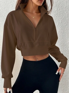 Women's vintage brown cropped quarter-zip sweatshirt in loose fit with a stand collar