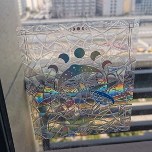 Rainbow suncatcher window cling with lunar phases and mushroom holographic pattern