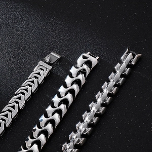 Punk style stainless steel dragon bone chain bracelets for men in three edgy metal textures
