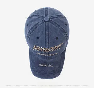 Top view of vintage washed navy baseball cap with high-density letter embroidery