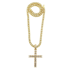 Glittering gold tennis chain necklace with a large crystal-encrusted cross pendant