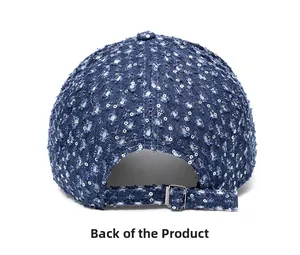 Detail view of denim baseball cap back with silver sequins and metal buckle closure