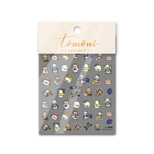 Close-up of cute cartoon penguin nail art stickers on a thin adhesive sheet to-1825