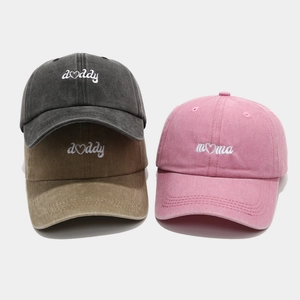 Distressed washed cotton baseball caps with Mama and Daddy embroidery in three colors