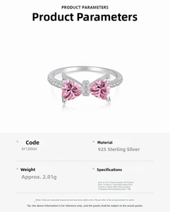 Macro detail of S925 silver bow ring with heart pink zircon and micro-pave diamonds