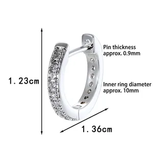 Silver-toned huggie earrings with cubic zirconia and 10mm inner diameter size details