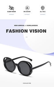 Detail view of oval hollow sunglasses with black glossy frame and stylish side cut-outs