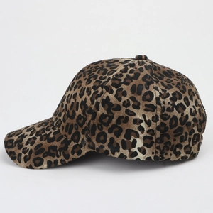 Side view of retro leopard print baseball cap with six-panel crown and curved brim