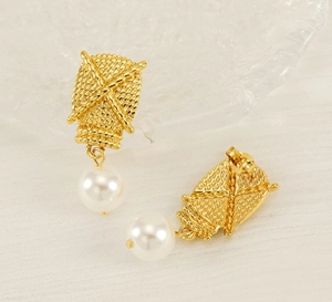 Detail of gold woven texture square stud earrings with dangling white round pearls