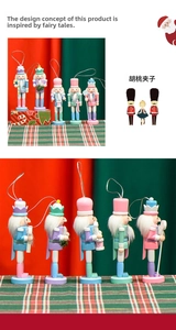Set of five 13cm macaron wooden nutcracker ornaments with festive hanging strings