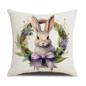 Easter bunny pillow cover with watercolor flower wreath and purple bow on beige linen