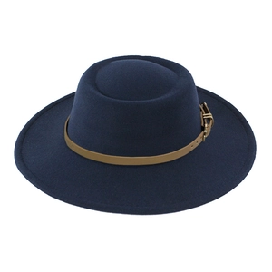 Detailed view of dark blue wool fedora hat with khaki leather band and gold metal buckle