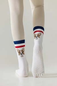 Detail view of five-finger yoga socks with cute Corgi pattern and anti-slip dots