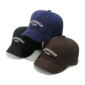 Three retro cotton short-brim baseball caps with embroidery in navy, black and coffee