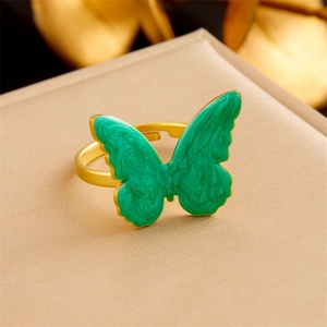 Gold plated stainless steel adjustable ring featuring a vibrant green enamel butterfly