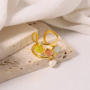 Gold multi-layer stainless steel ring featuring colorful gemstones and a pearl pendant