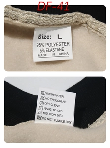 Detail view of clothing label showing 95% polyester fabric and washing instructions