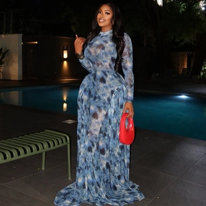 Detail of blue tie-dye printed long mesh dress with long sleeves and high neckline