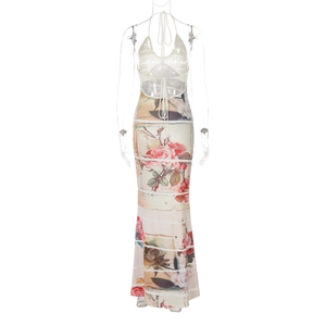 Detail view of backless knit halter maxi dress with printed skirt on a mannequin