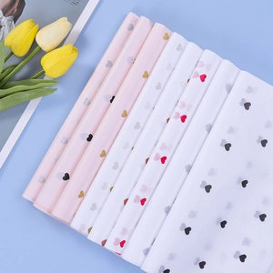 Pastel tissue paper with heart patterns for floral bouquets and gift wrapping