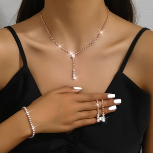 Rose gold bridal jewelry set with sparkling rhinestones necklace bracelet and earrings