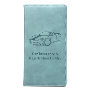 Detail of light blue PU leather car insurance and registration holder with embossed design