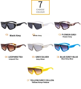 Detail of star-decorated oversized sunglasses in seven colors with thick frames