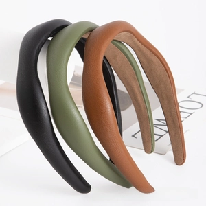 Three-piece set of leather headbands in black, olive green, and brown in vintage style