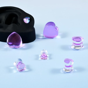 Pink purple glass heart ear gauges set with mannequin ear model for display