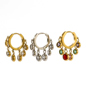Three pairs of stainless steel hoop earrings with colorful zircon tassels on white background
