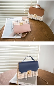 Detailed view of plaid PU leather crossbody bags with gold chains in pink, blue, and brown