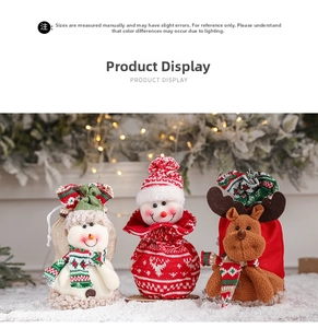 Three festive Christmas drawstring gift bags featuring snowman and reindeer characters