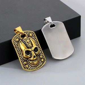 Gothic skull pendant in gold and silver steel finishes with embossed mechanical details