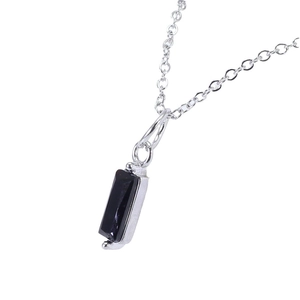 Silver necklace with rectangular black zircon star pendant on a clean white background