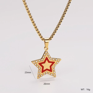 Detailed view of gold star pendant with red enamel, 23mm x 26mm dimensions and 16g weight