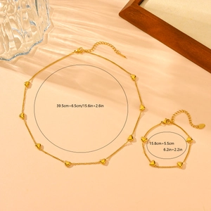Golden stainless steel heart necklace and bracelet set with size specifications