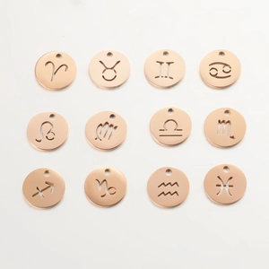 Detailed set of 12 rose gold zodiac sign pendants in mirror polished stainless steel