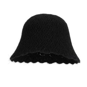 Solid black knitted bucket hat for women with thick wool texture and wavy brim design