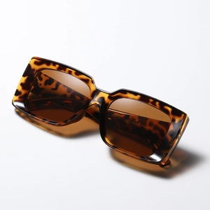 Fashionable oversized tortoise square sunglasses with brown lenses in a 45-degree angle view