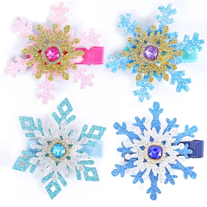 Set of four snowflake hair clips with rhinestones and gems in assorted colors