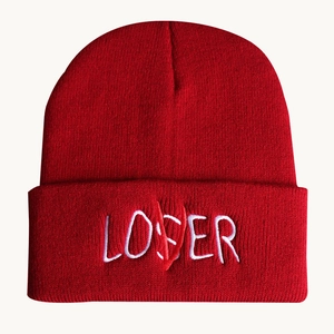 Red knit beanie with LOSER embroidery and V line detail for casual street style