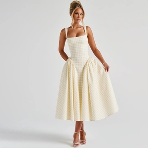 Detail view of a French style yellow plaid midi dress featuring a square neck and A-line cut